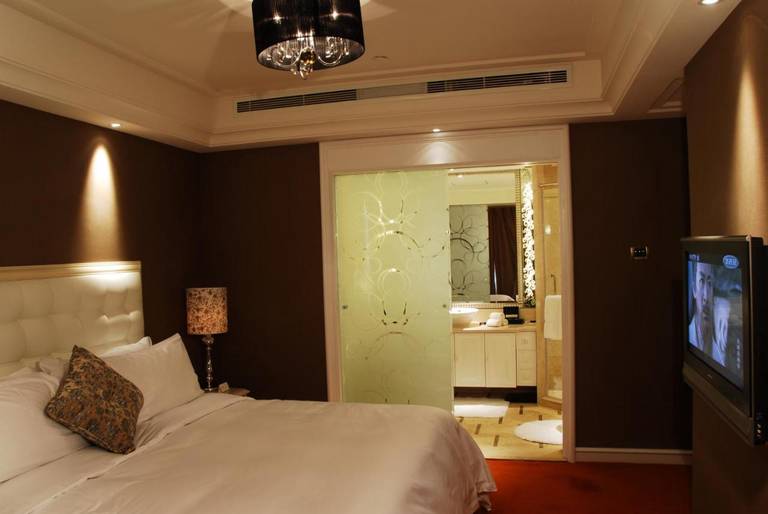 Wealthy All Suite Hotel Suzhou 