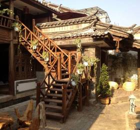 Gudao Inn  в Лицзяне