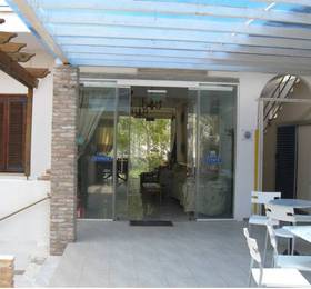 Myrmidon Hotel  в Аттике
