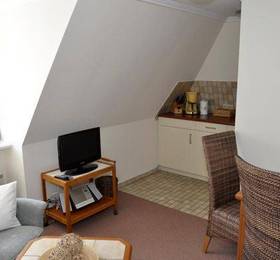 Rantum Dorf - Ferienappartments im Reetdachhaus 3  в Рантуме