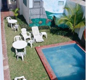 Hostal Vive la Vida  в Плая Дел Кармен