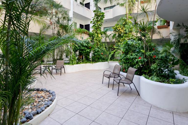 Encanto Riviera Condo Hotel
