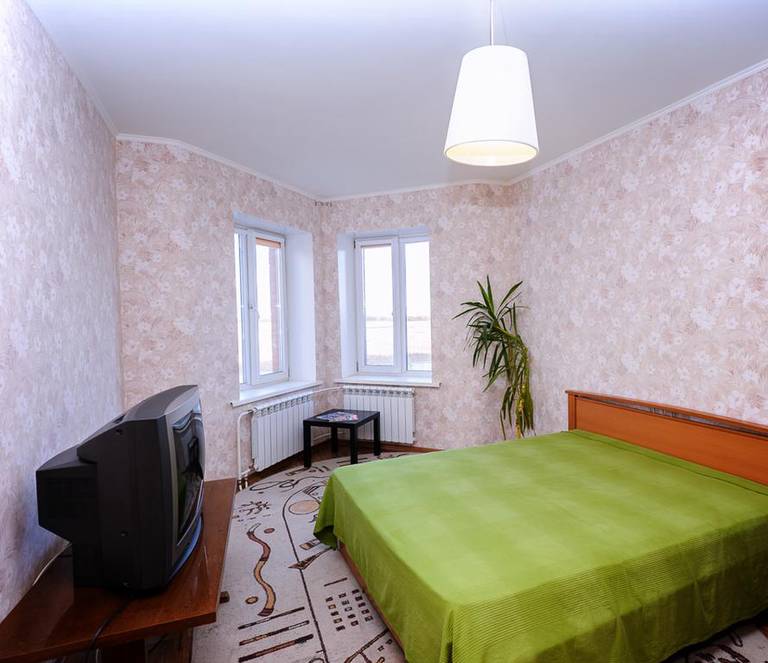 Apartment Berloga 55 on Transsibirskaya 6/1