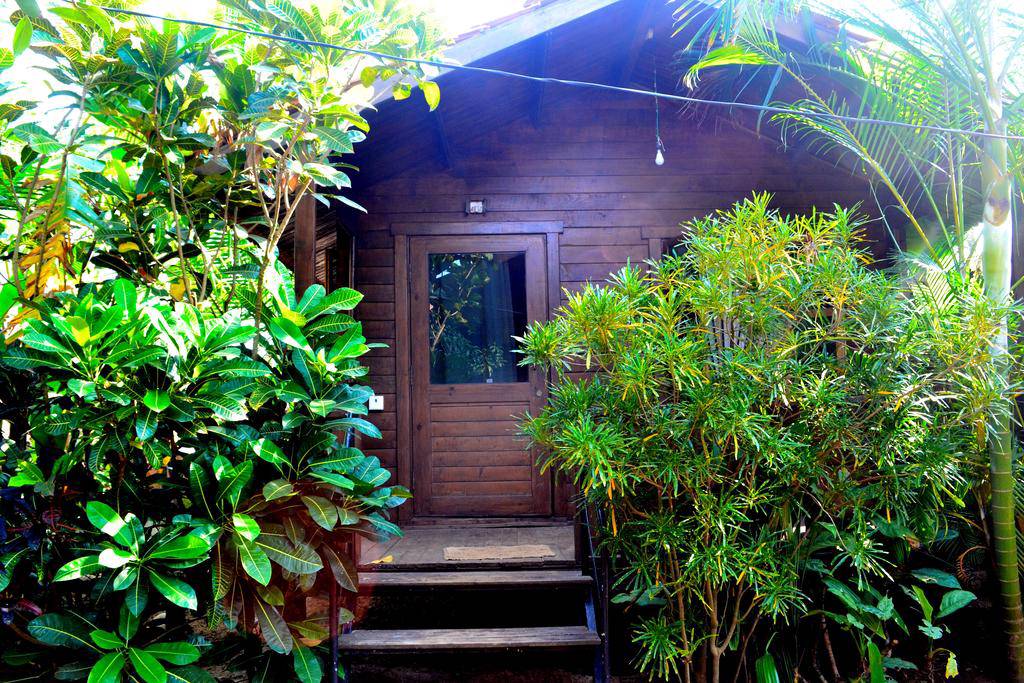 Pele's Windsong Wood Cottage on the beach